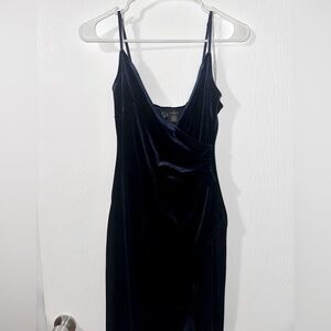 Navy blue suede maxi dress. Beautiful v-neck cut and ruched bodice.